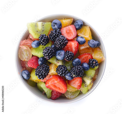 Bowl with fruit salad on white background