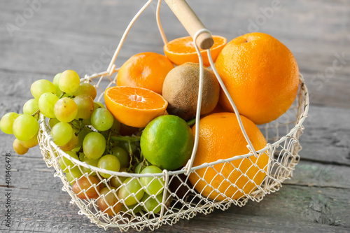 Fresh fruit basket with ora...