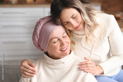 Daughter visiting her mother after chemotherapy at home photo