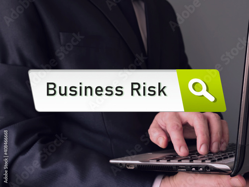 Business concept meaning Business Risk with phrase on the sheet.