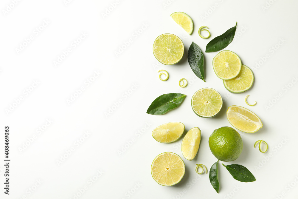 Flat lay with ripe lime on white background