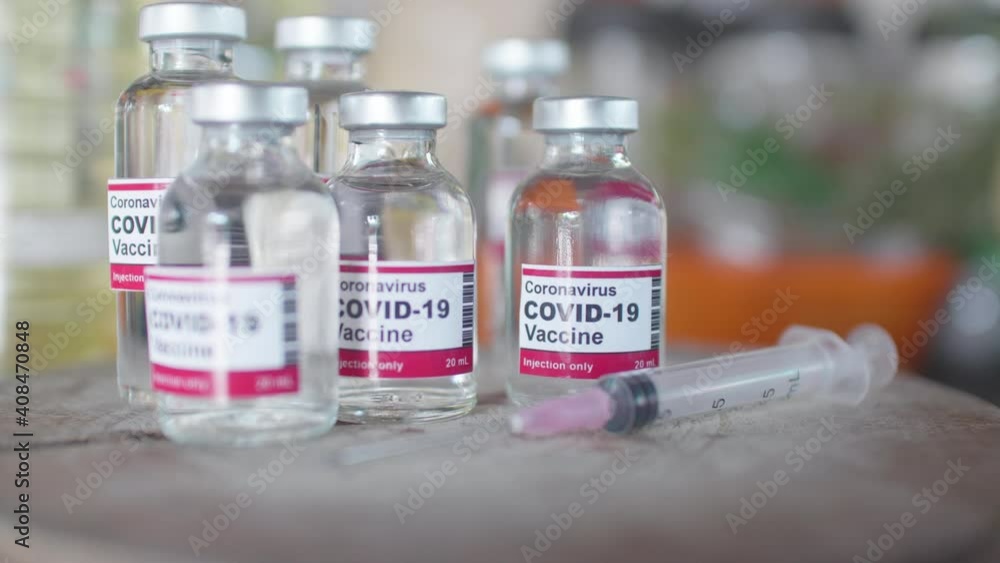 Vaccine and syringe injection. It use for prevention,immunization and treatment from corona virus infection(novel coronavirus disease 2019,COVID-19,nCoV 2019. Medicine infectious concept. Vaccine and syringe injection. It use for prevention,immunization and treatment from corona virus infection(novel coronavirus disease 2019,COVID-19,nCoV 2019. Medicine infectious concept.