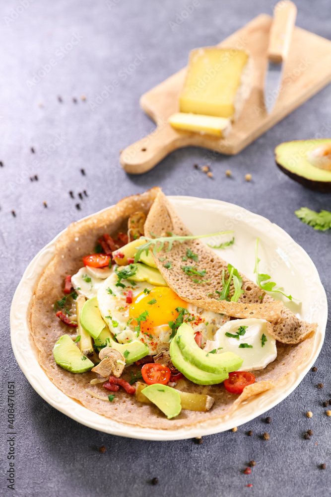 buckwheat crepe with egg, cheese and vegetables