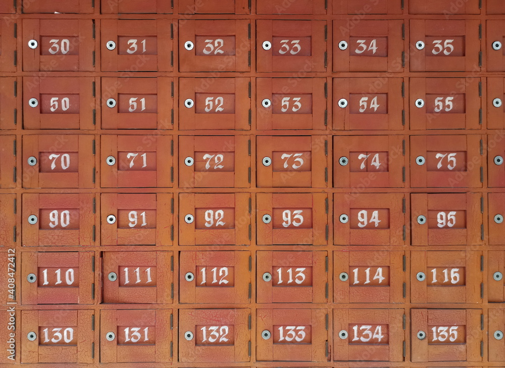 Colorful wood post box with numbers