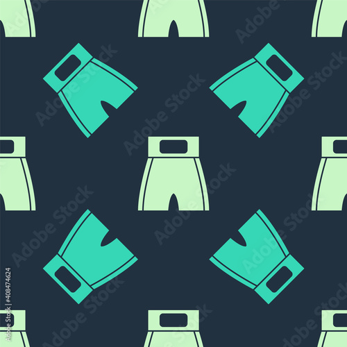 Green and beige Boxing short icon isolated seamless pattern on blue background. Vector.