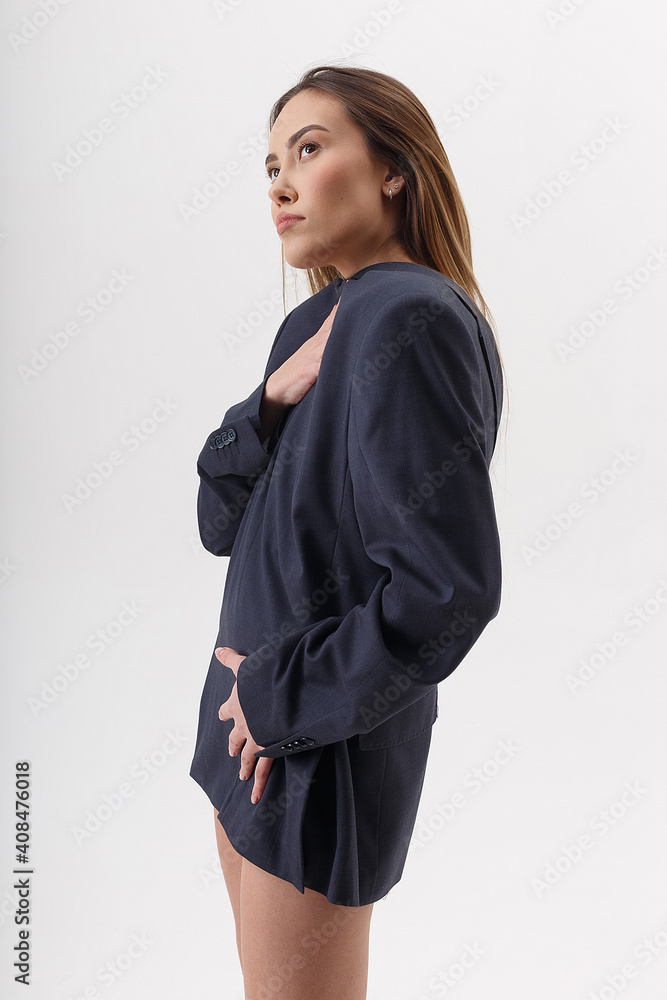 portrait of young attractive asian woman with long hair wearing blue suit on the contrary, isolated on white studio background. skinny pretty female posing on cyclorama. model tests of beautiful lady portrait of young attractive asian woman with long hair wearing blue suit on the contrary, isolated on white studio background. skinny pretty female posing on cyclorama. model tests of beautiful lady