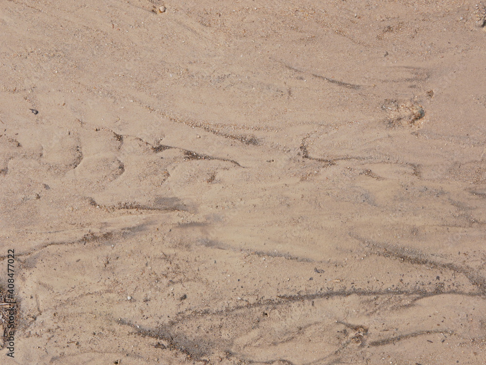 Sand at the bottom of a river, after the river runs dry Sand at the bottom of a river, after the river runs dry