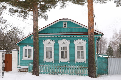 Vintage wooden rural house with ornamental windows, carved frames in Nerekhta town, Kostroma region, Russia. Russian folk style in architecture. Russian village. Nerekhta architectural landmark, sight photo