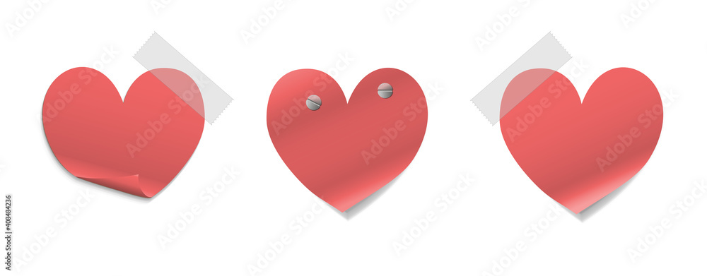 Three red heart shaped sticky notes attached to a white background with screws and tape. Three red heart shaped sticky notes attached to a white background with screws and tape.