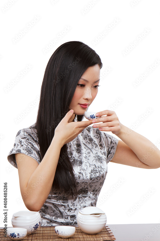 Wear cheongsam Oriental young females in the tea Wear cheongsam Oriental young females in the tea