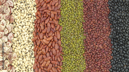 Assortment of many kinds of beans as background.