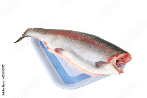 Raw fresh trout fish on a white background. Fish carcass without a head