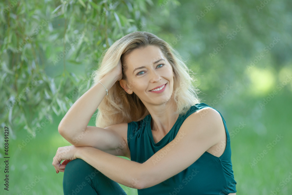 Beautiful Young Woman Relaxing outdoors Beautiful Young Woman Relaxing outdoors