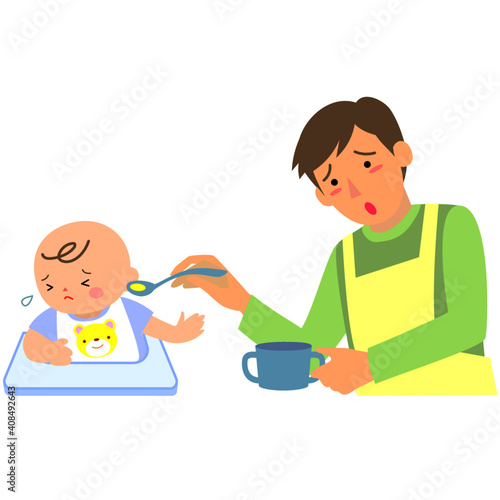 離乳食を嫌がる男の赤ちゃんと父親
