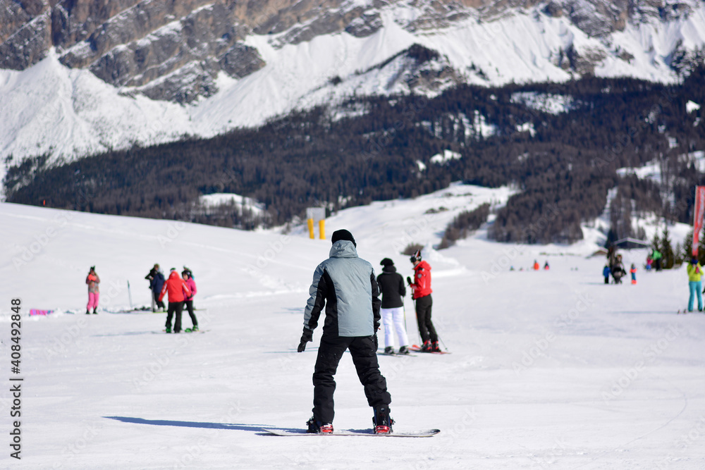 skiers on ski slope