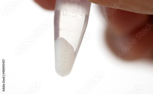 Vászonkép At the bottom of the centrifuge test tube, protein particles are settle