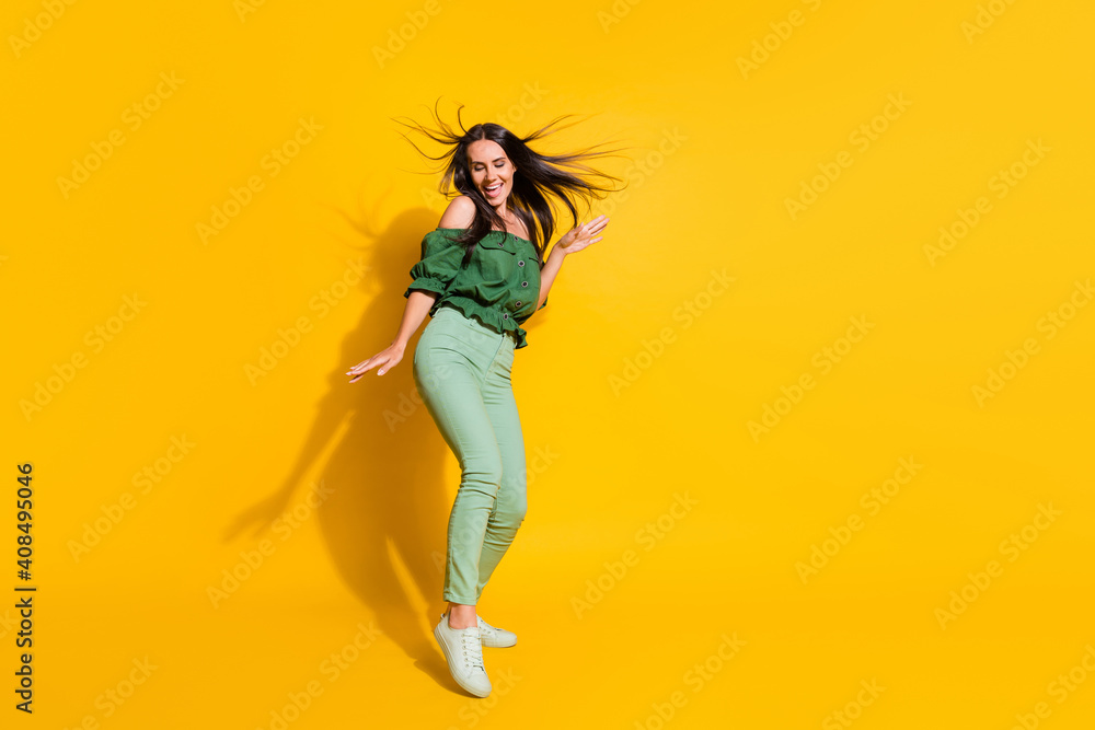 Photo portrait full body view of dancing girl isolated on vivid yellow colored background with blank space - obrazy, fototapety, plakaty 