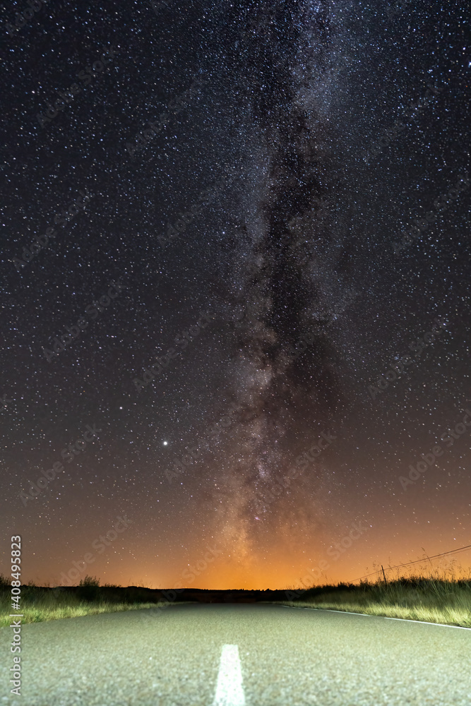 Empty road and milky way over it Empty road and milky way over it