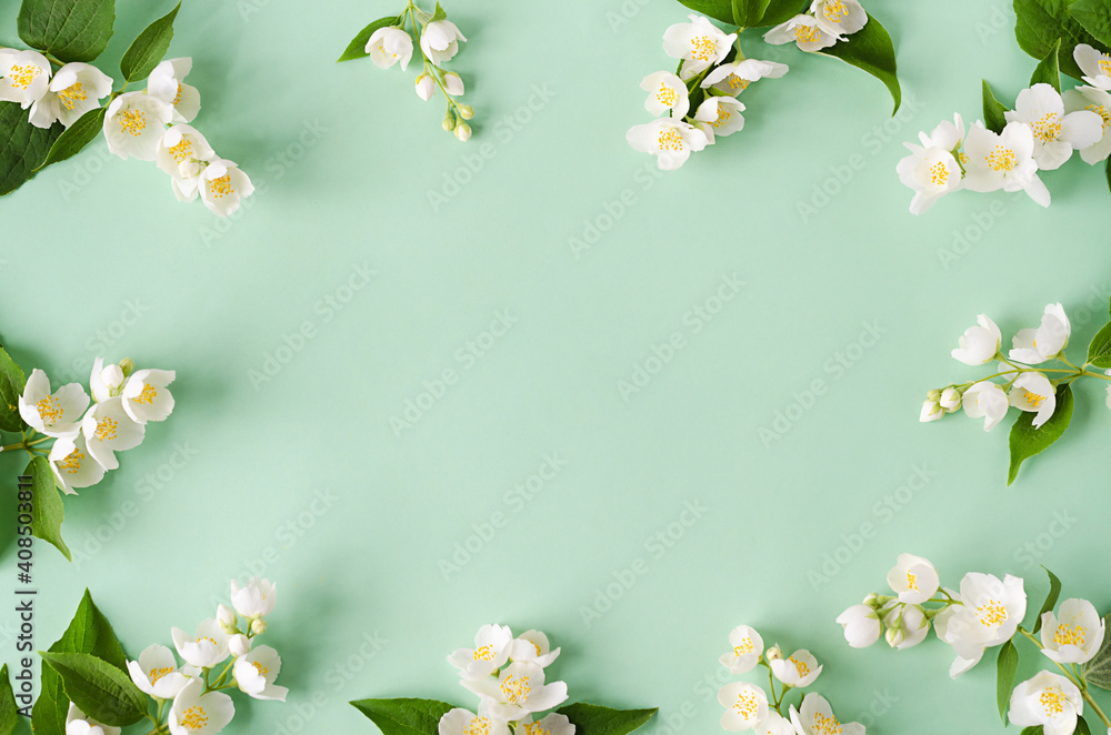frame from flowers and branches of jasmine on green background. design  spring floral greeting card, wedding invitation, natural cosmetic,  packaging and herbal tea. copy space, text Stock Photo | Adobe Stock