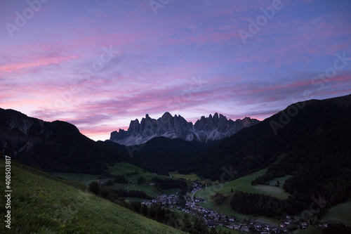 Sunrise over the small Italian mountain town of St. Magdalena in Val di Funes © TPhotography