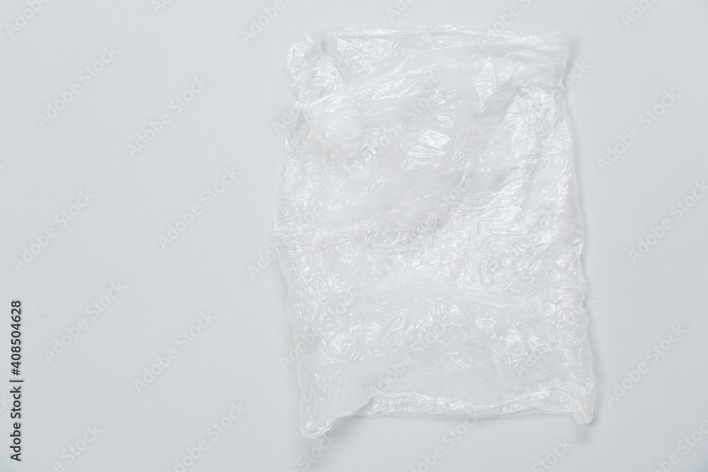 close-up of used plastic bag on gray background close-up of used plastic bag on gray background