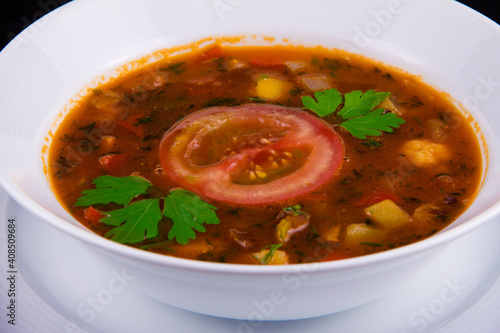 Hungarian goulash - thick vegetable soup with beef and tomatoes