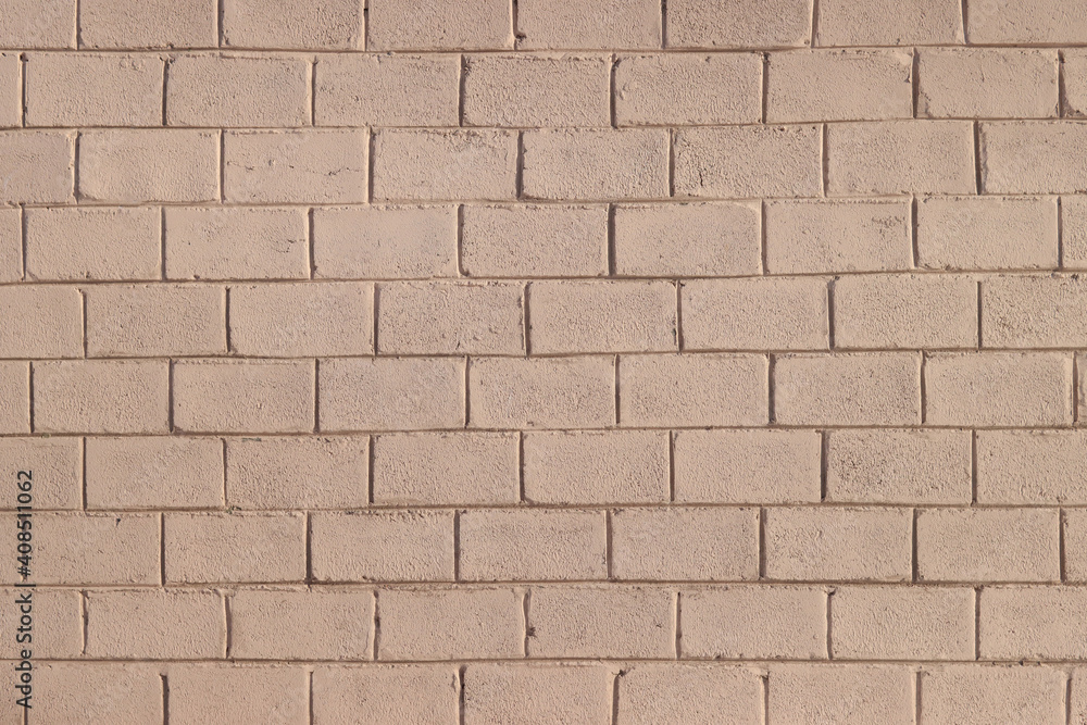 Fototapeta premium Beige brick wall, background, texture