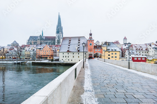 Regensburg City trip in winter time. View from the stone bridge