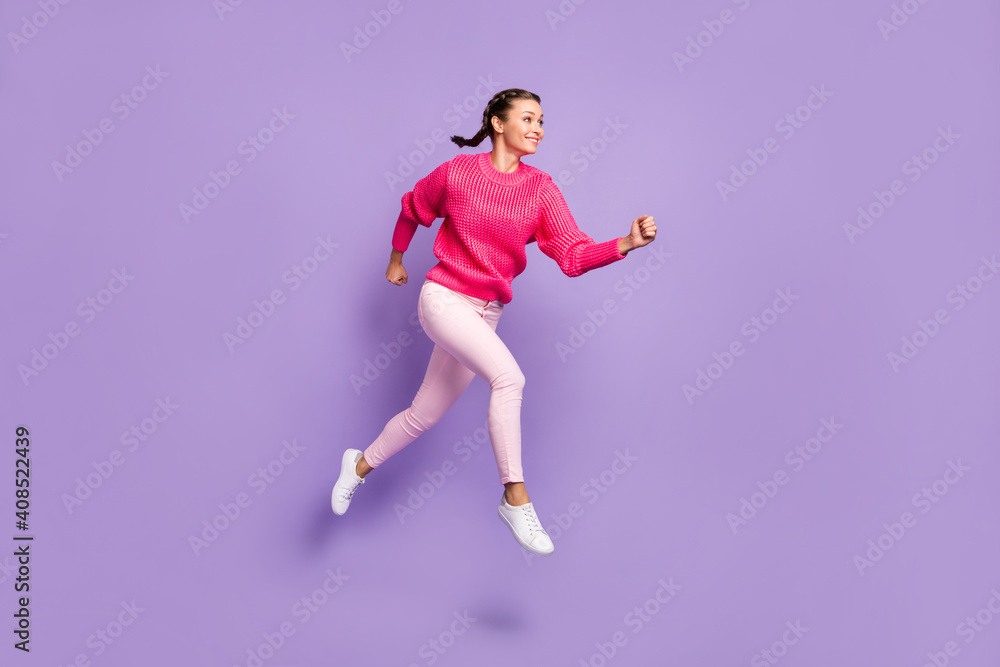 Full length profile side photo of excited happy woman run jump sale empty space isolated on violet color background