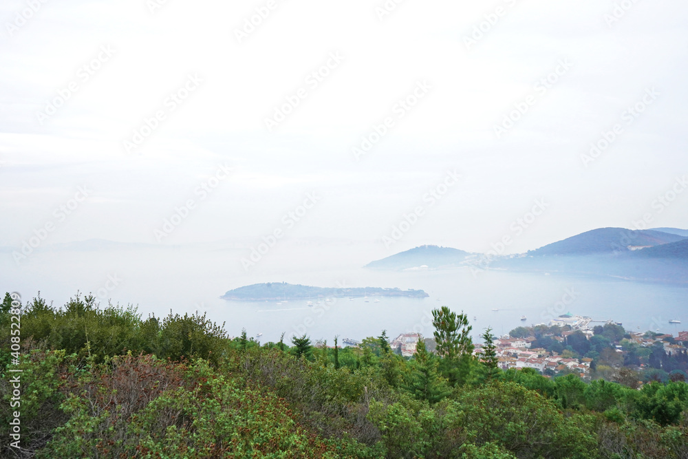Fototapeta premium Foggy landscape from an island.