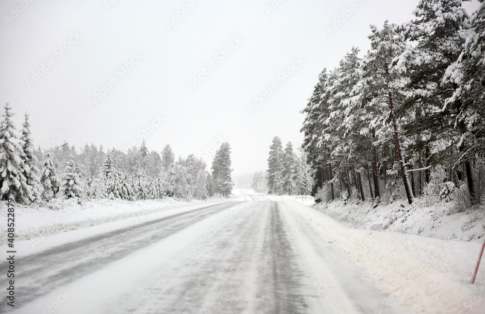 Snow covered Forest Road in Sweden