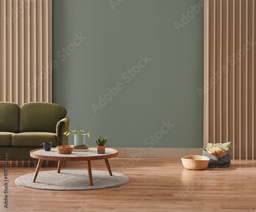 Green wall background, minimalist sofa, marble pattern wooden sofa, grey carpet, poster, lamp and frame.