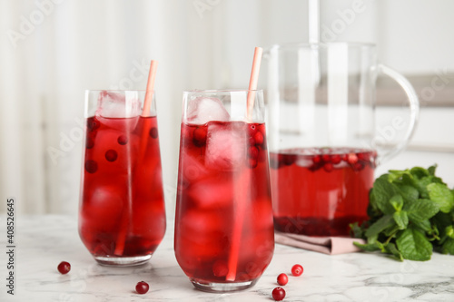 Wallpaper Mural Tasty refreshing cranberry cocktail on white marble table indoors Torontodigital.ca