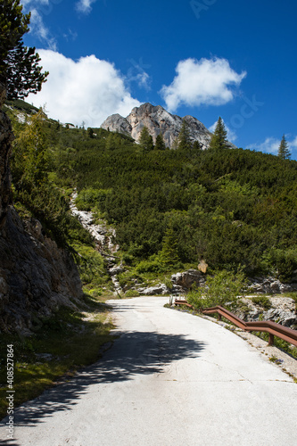 Breathtaking panorama of the Fedaia pass dam in the Dolomites. Border between Trentino Alto Adige and Veneto