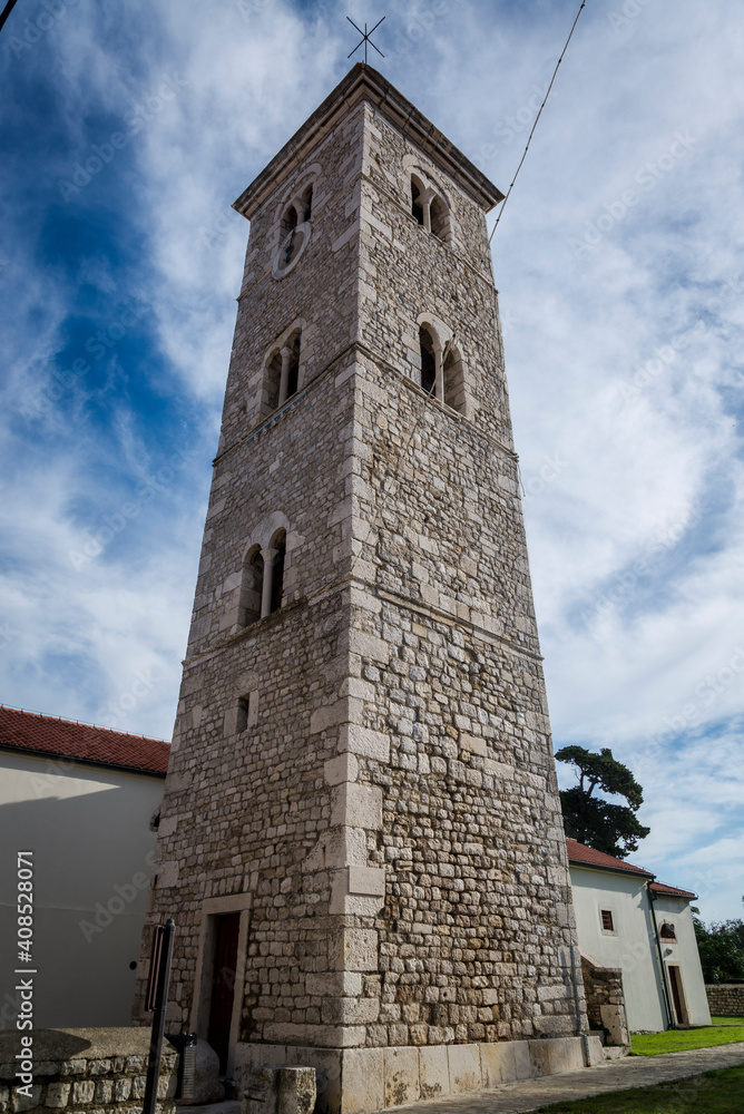 Bell tower of the Church of St Anselm from 12th century, Nin, a historic town in the Zadar County, Dalmatia, Croatia