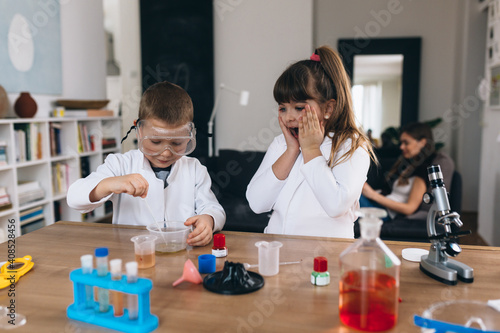 children do chemical experiments from kitchen ingredients at home