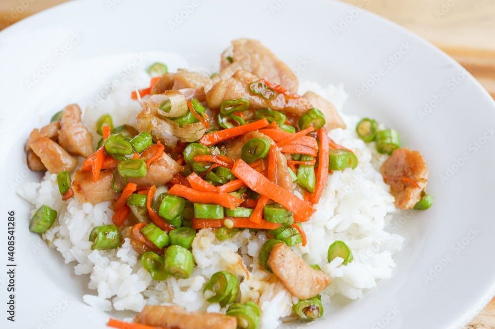 pork and vegetable fried on hot rice - Thailand healthy food pork and vegetable fried on hot rice - Thailand healthy food