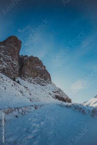 Winter landscape, mountains peaks covered by snow and rocks