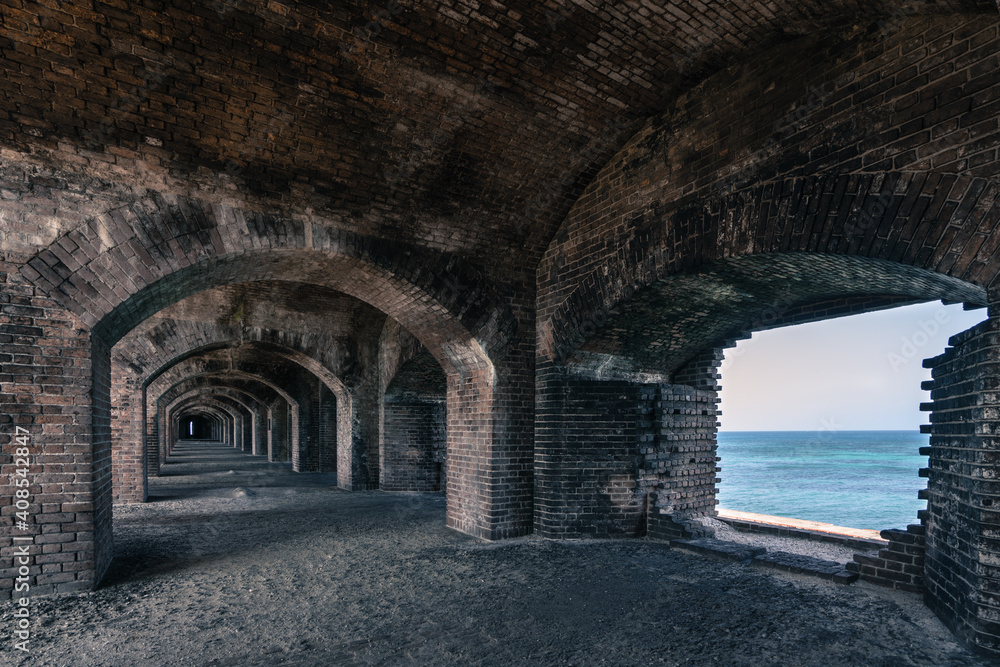 Fototapeta premium Archway in mysterious Fort Jefferson in Dry Tortugas. Corridors in the biggest brick construction in Americas on an island close to Key West.