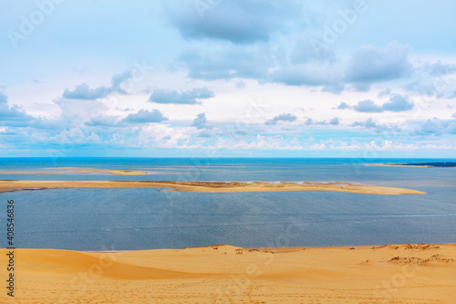 Fototapeta Naklejka Na Ścianę i Meble -  Sandy Coast of Atlantic Ocean . Landscape with islands in the bay  .  Natural feature Dune of Pilat