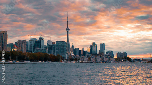 Photography City of Toronto captured from lake Ontario during beautiful sunset with an orang