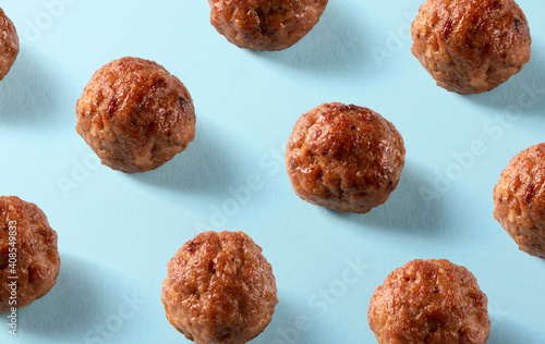 Canvastavla American beef meatballs pattern on blue background