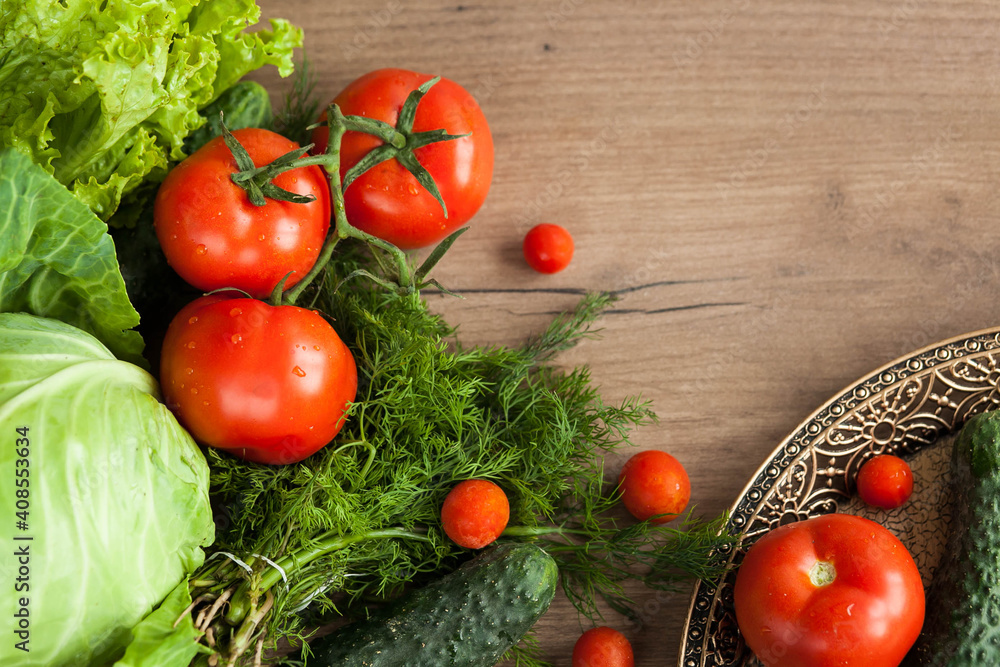 Healthy eating. The concept of healthy food, fresh vegetables on a wooden background. View from above. Copy space. Healthy eating. The concept of healthy food, fresh vegetables on a wooden background. View from above. Copy space.