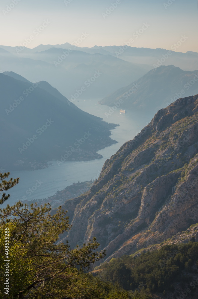 Beautiful sunset over the Kotor Bay in Montenegro. Panorama of mountains, sea and fjord. Beautiful sunset over the Kotor Bay in Montenegro. Panorama of mountains, sea and fjord.