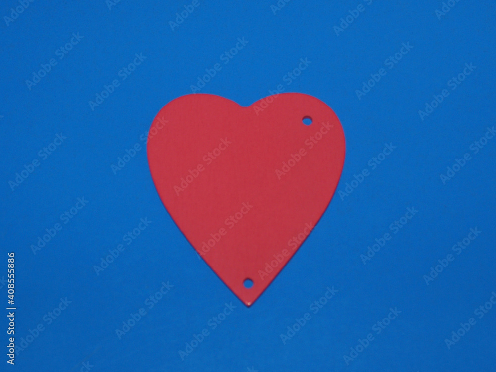 Pink and red hearts on a blue background. Valentine's day.