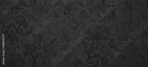 Old black anthracite vintage shabby patchwork damask motif tiles stone concrete cement wall texture background