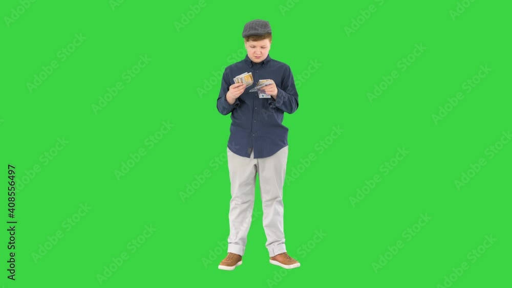 Rich teenager Happy boy counting euros on a Green Screen, Chroma Key. Rich teenager Happy boy counting euros on a Green Screen, Chroma Key.
