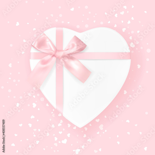 Heart shaped white Gift Box tied with pink Ribbons with a Bow on