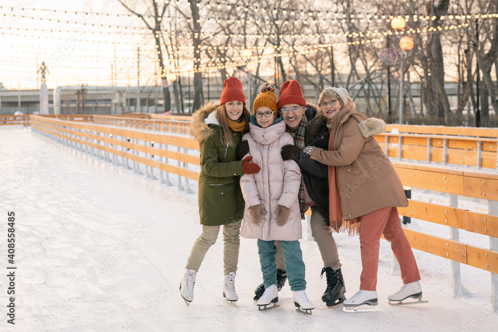 © pressmaster - Happy family on ice rink © pressmaster - Happy family on ice rink