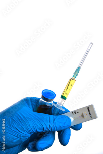 Male doctor hand in blue glove holds corona virus test, syringe and vial bottle with covid 19 vaccine dose. Coronavirus cure, flu medicine treatment vaccination concept.
